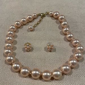 Pink Pearl necklace with pink Pearl and diamond earrings.
